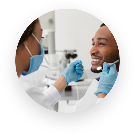 Circle photo of dental patient with dentist